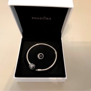 Pandora Bracelet with charm (gently used) 7.1” (L)
